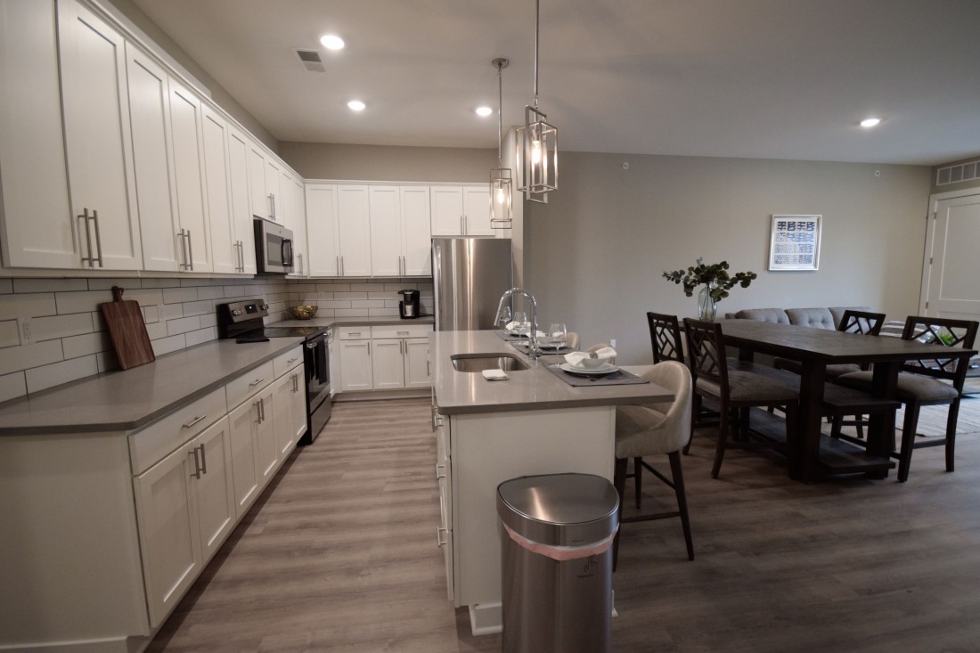 Furnished apartment kitchen and dining table